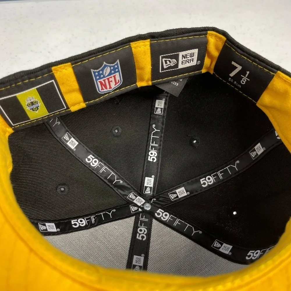Pittsburgh Steelers New Era size 7 1/8 Fitted baseball cap. NFL 100 patch